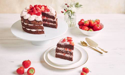 delicious-sweet-cake-with-strawberries-baiser-plate_181624-43237