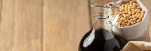 soybean-sauce-soybean-wooden-floor-soy-sauce-food-nutrition-concept_1150-26327